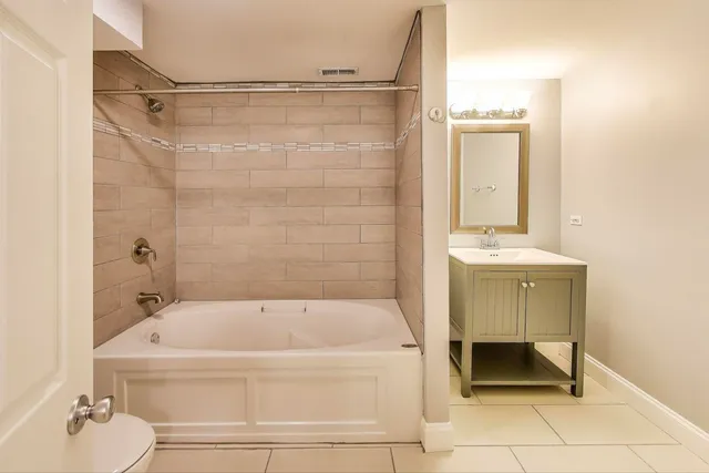 a view of a golf course with a lake view