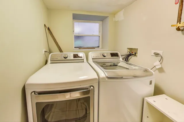 a picture of a bathroom with a shower