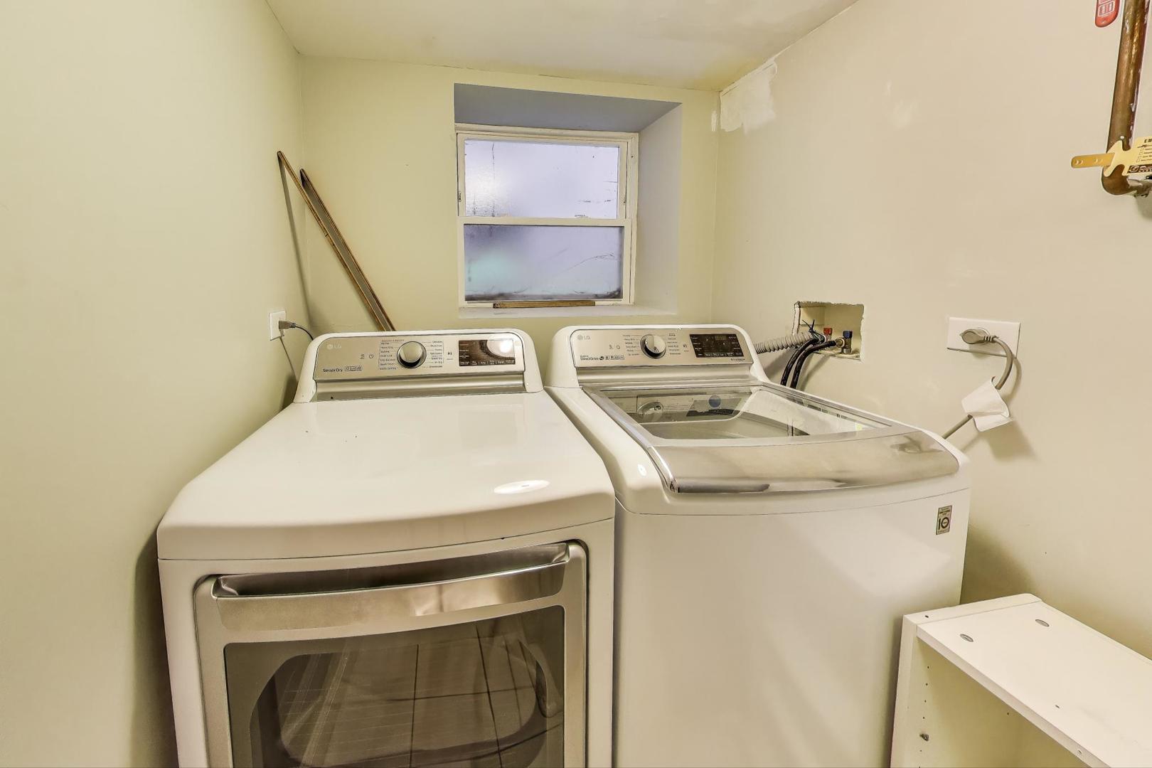 7730 North Paulina Street, Unit 1 Chicago, IL 60626 - Photo 48 of 59 a utility room with dryer and washer