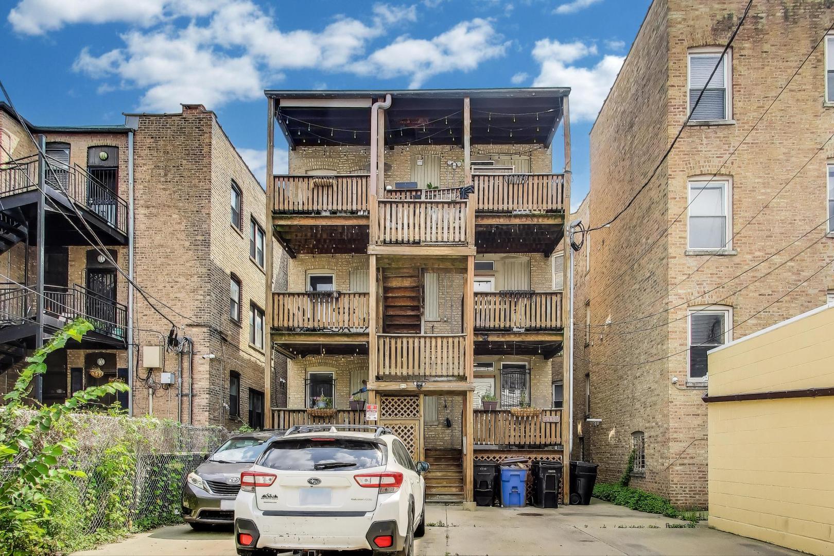 7730 North Paulina Street, Unit 1 Chicago, IL 60626 - Photo 52 of 59 a car parked in front of a building