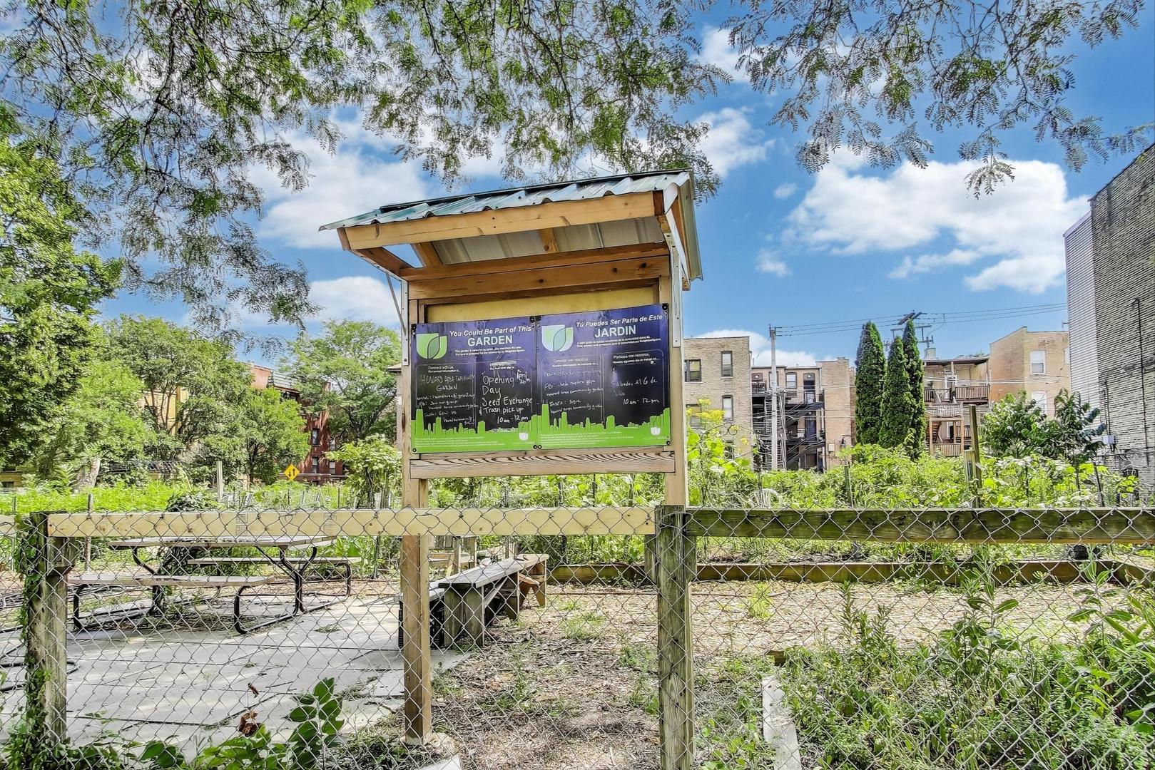 7730 North Paulina Street, Unit 1 Chicago, IL 60626 - Photo 53 of 59 a backyard of a house with a yard table and chairs