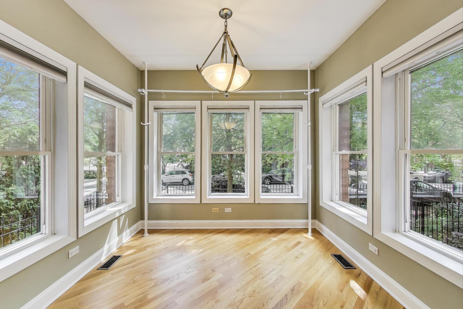 7730 North Paulina Street, Unit 1 Chicago, IL 60626 - Photo 7 of 59 a view of an empty room with a window