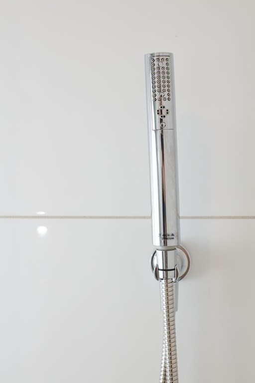 932 Broadway, Unit 212 Chelsea, MA 02150 - Photo 20 of 35 a close view of shower tap
