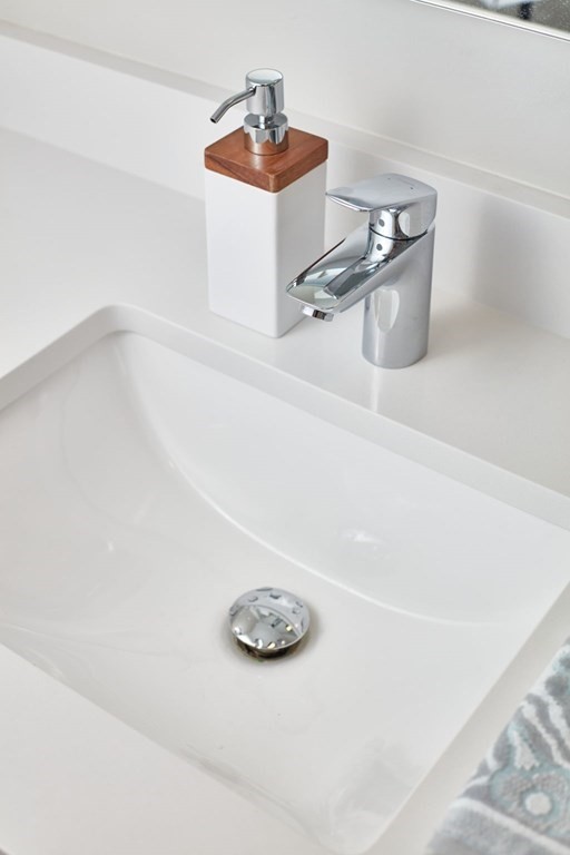 932 Broadway, Unit 212 Chelsea, MA 02150 - Photo 21 of 35 a bathroom with a sink