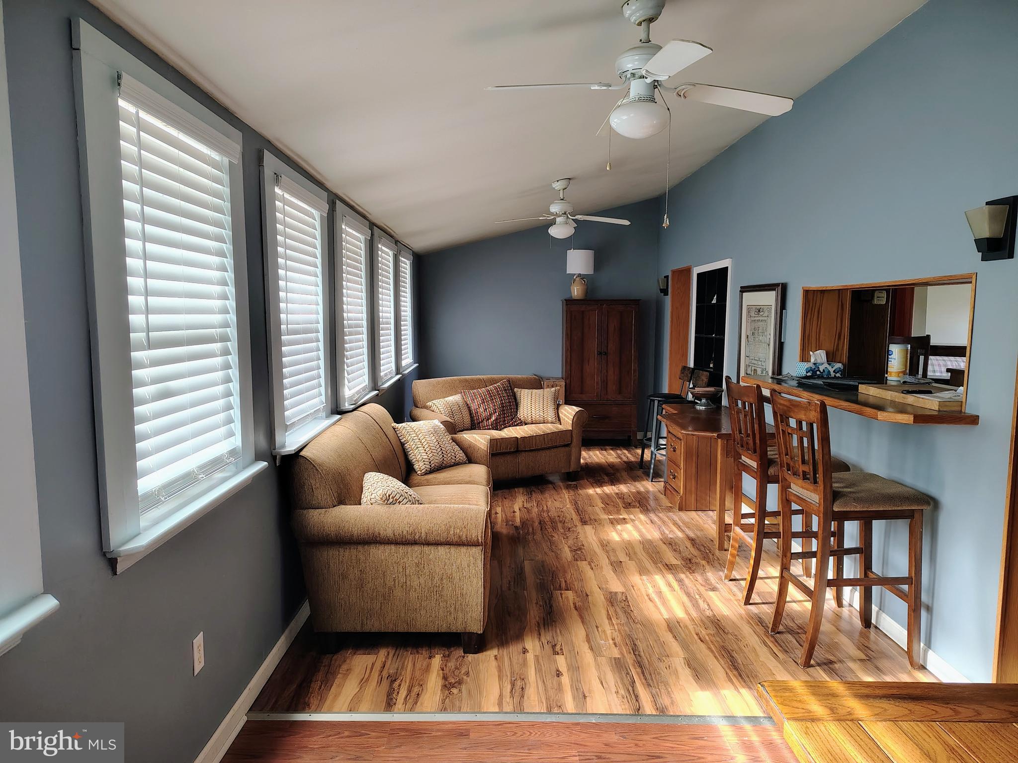 8065 Bull Road Lewisberry, PA 17339 - Photo 2 of 21 a living room with furniture and wooden floor
