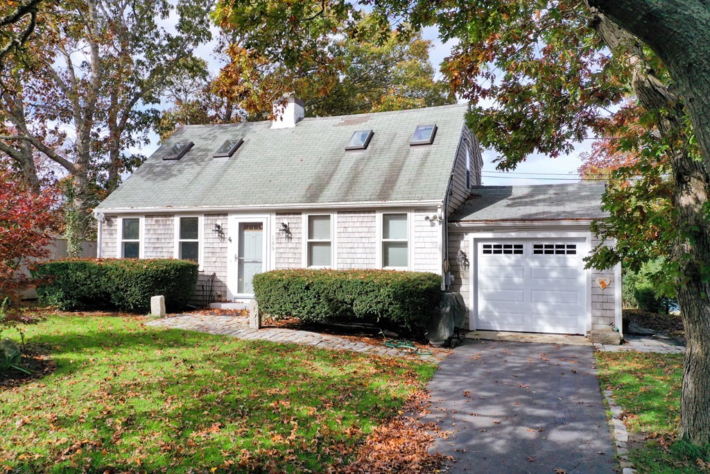189 Tahanto Road Bourne, MA 02559 - Photo 1 of 24 a view of a house with garden and yard
