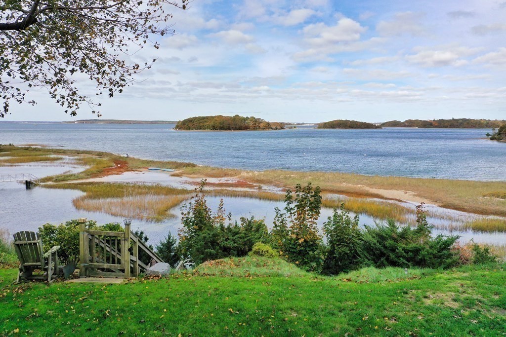 189 Tahanto Road Bourne, MA 02559 - Photo 22 of 24 a view of a lake with a yard