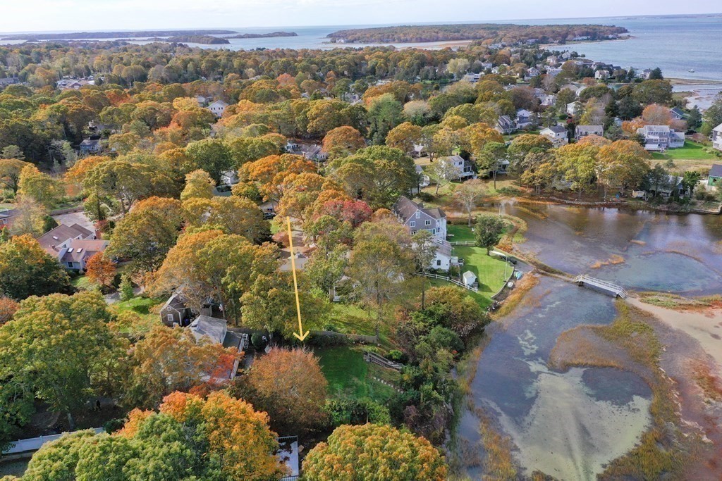 189 Tahanto Road Bourne, MA 02559 - Photo 23 of 24 an aerial view of a houses with a lake view