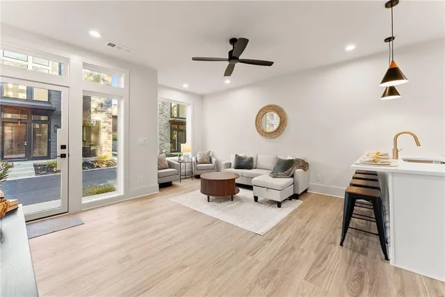 a living room with furniture and a window