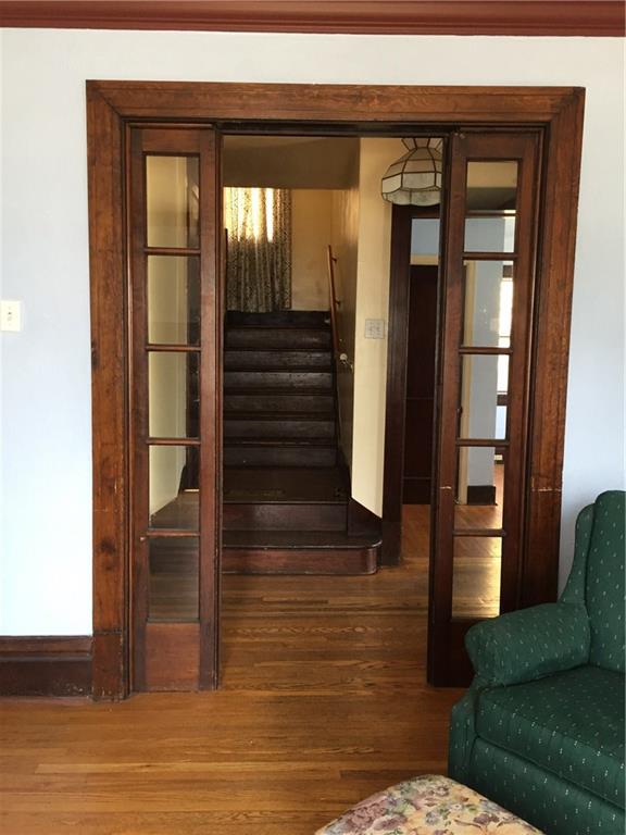 402 Vermont Avenue Rochester, PA 15074 - Photo 7 of 24 Beautiful French pocket doors with view of entry and stairs.