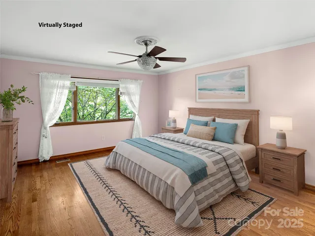 a bedroom with a large bed and a window