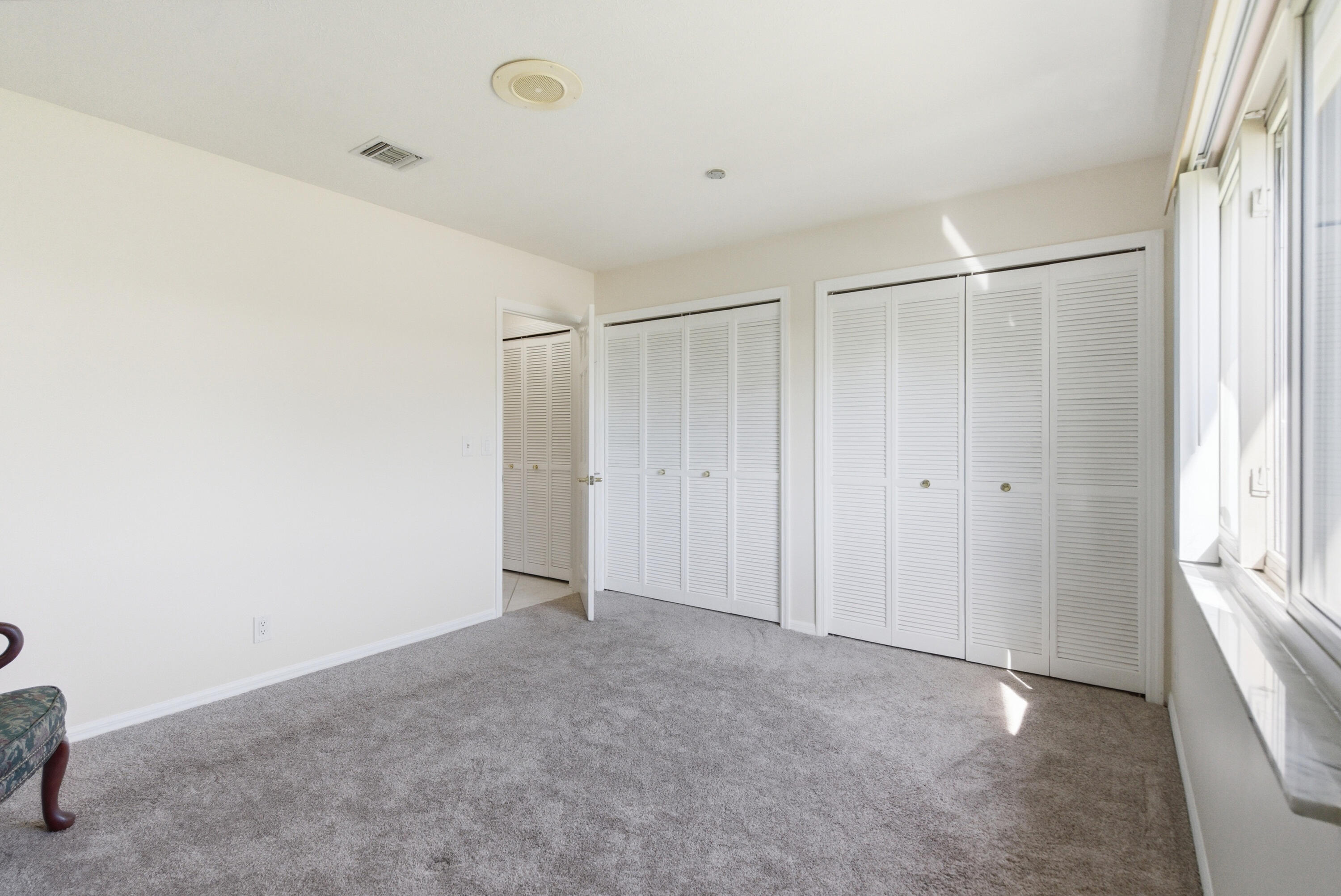 5151 Southeast Burning Tree Circle Stuart, FL 34997 - Photo 36 of 74 a view of an empty room