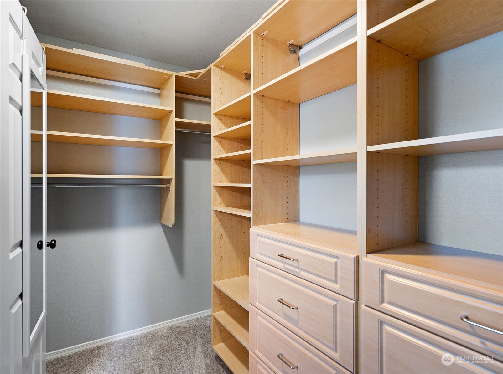 16887 Copper Mountain Road Southeast Monroe, WA 98272 - Photo 21 of 34 a view of walk in closet with empty racks