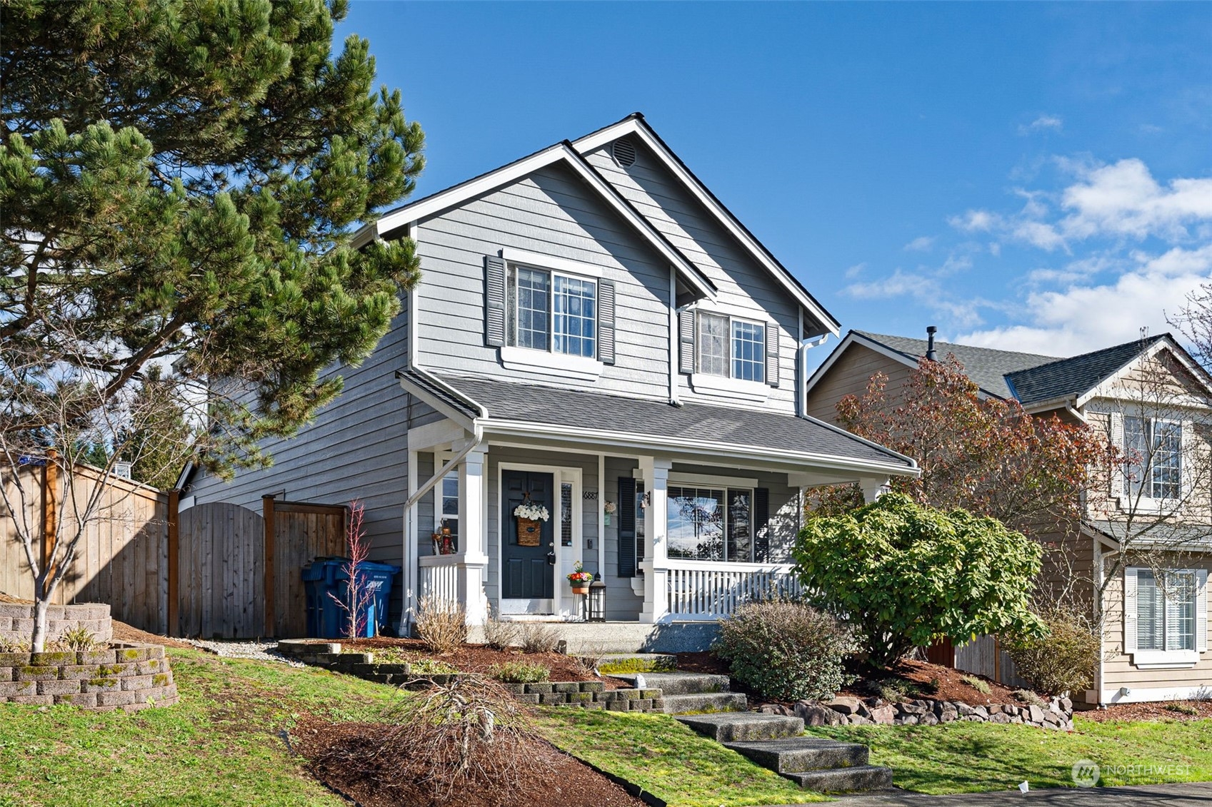 16887 Copper Mountain Road Southeast Monroe, WA 98272 - Photo 33 of 34 a front view of a house with garden