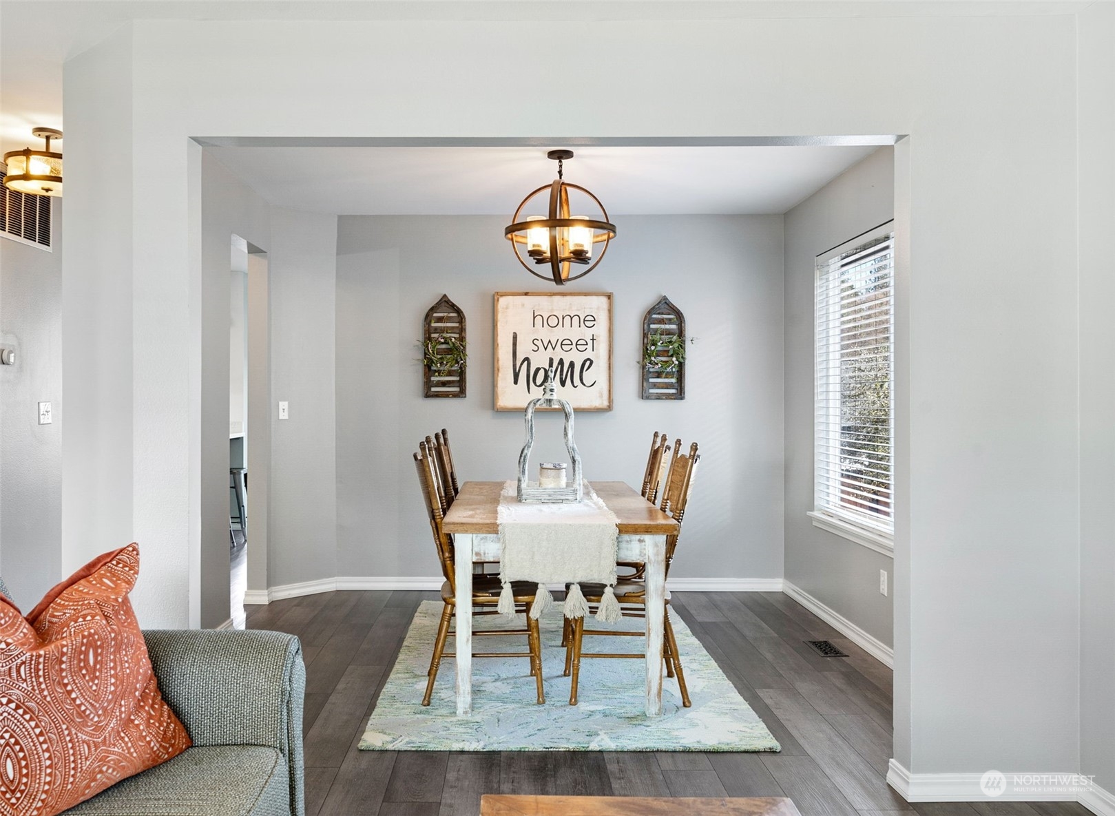 16887 Copper Mountain Road Southeast Monroe, WA 98272 - Photo 6 of 34 a view of a dining room with furniture window and wooden floor