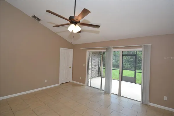 a view of a glass door of the house