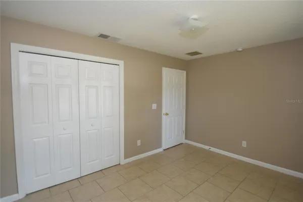 a view of a bathroom from a hallway