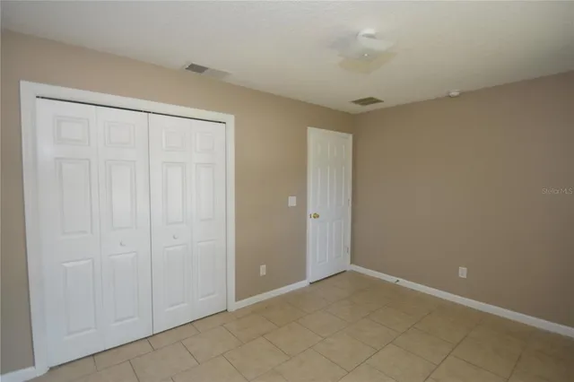 a view of a bathroom from a hallway