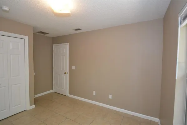 a view of room with ceiling fan