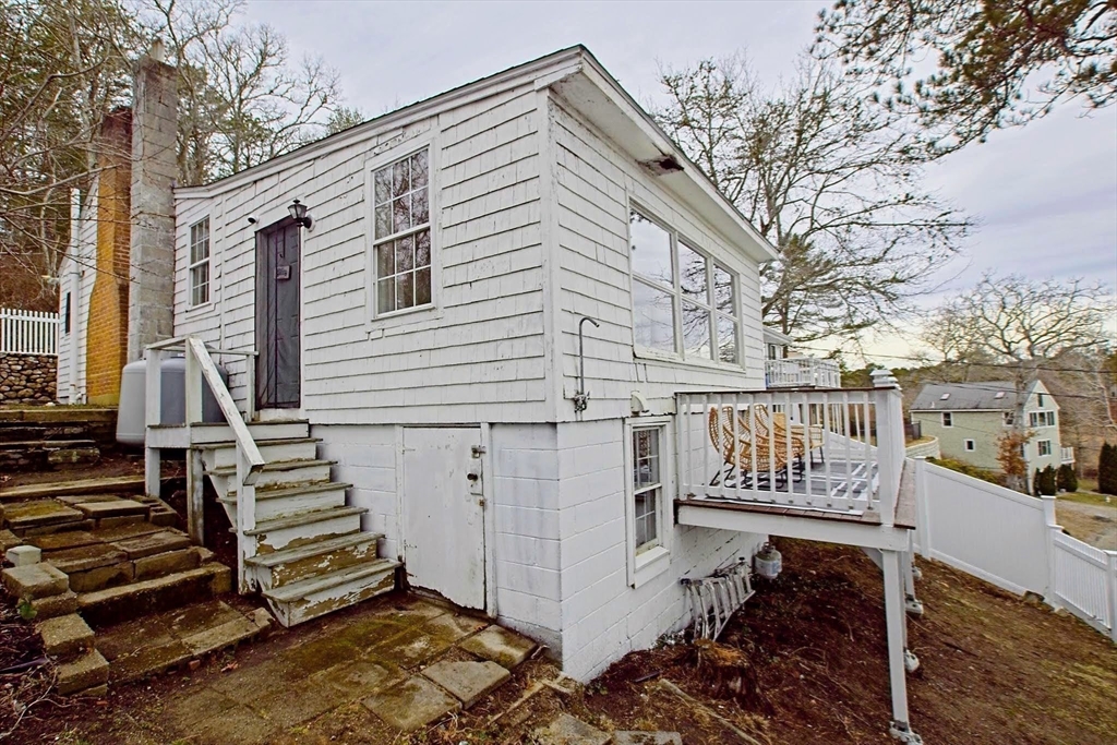 21 Hillside Road Plymouth, MA 02360 - Photo 12 of 39 a view of a street with wooden stairs