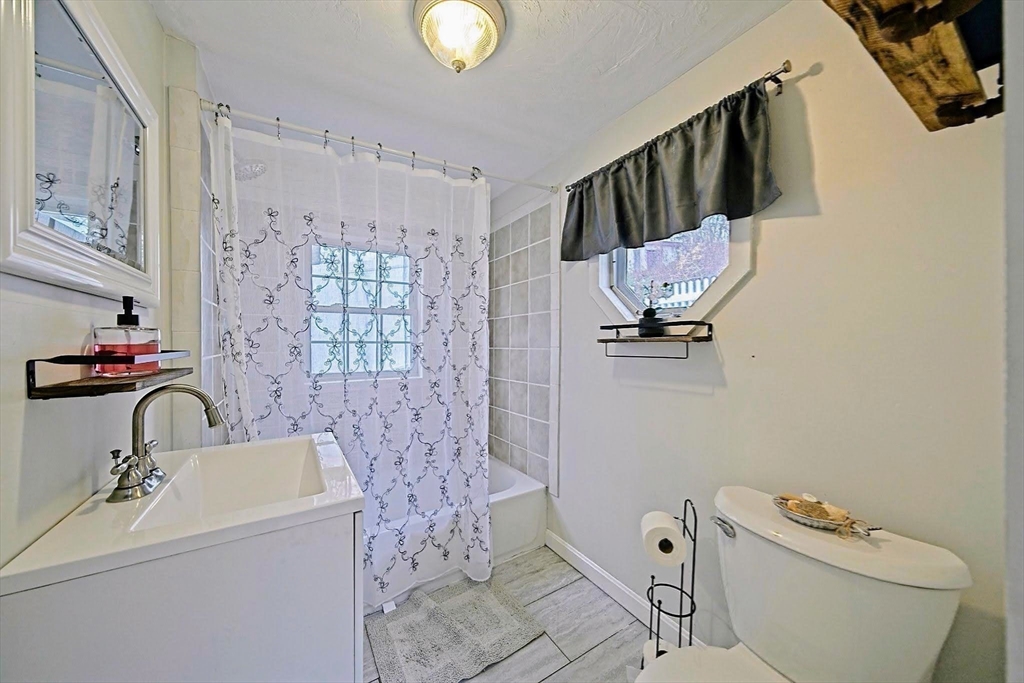 21 Hillside Road Plymouth, MA 02360 - Photo 25 of 39 a bathroom with a sink toilet and shower