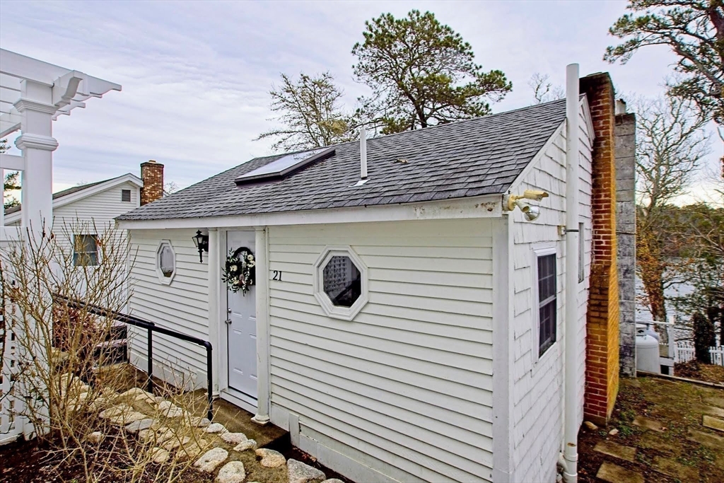 21 Hillside Road Plymouth, MA 02360 - Photo 9 of 39 a front view of a house with white walls