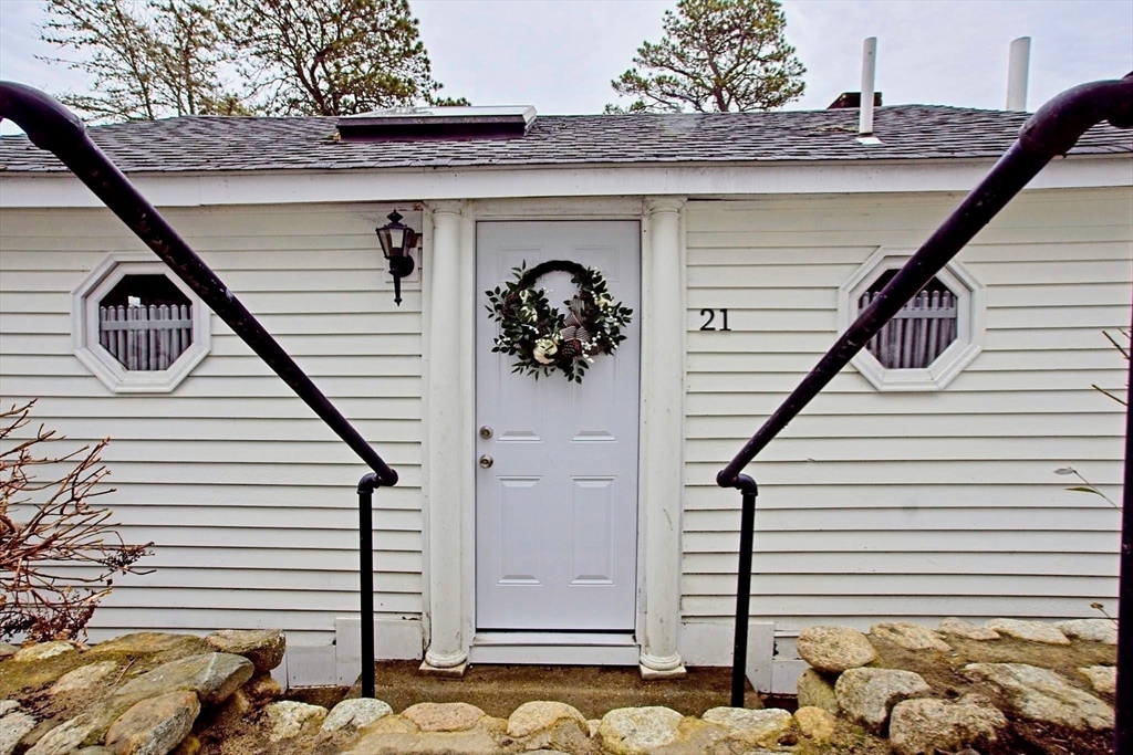 21 Hillside Road Plymouth, MA 02360 - Photo 10 of 39 a front view of a house with parking