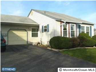 8A Mill Road, Unit B Whiting, NJ 08759 - Photo 1 of 3 a view of a house with backyard
