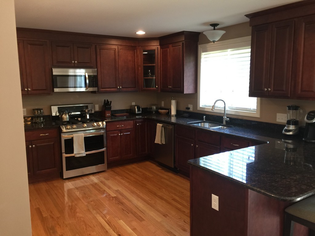 3 Pinnacle Road Monson, MA 01057 - Photo 4 of 8 a kitchen with a sink stove top oven and cabinets