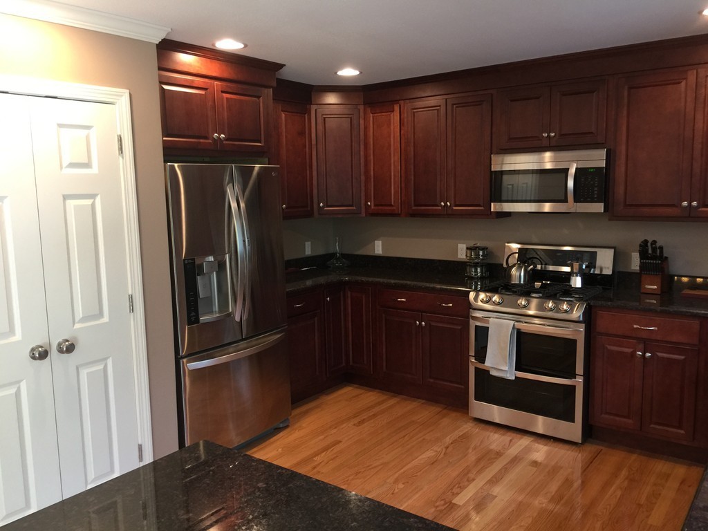 3 Pinnacle Road Monson, MA 01057 - Photo 5 of 8 a kitchen with stainless steel appliances granite countertop a refrigerator a sink and a stove