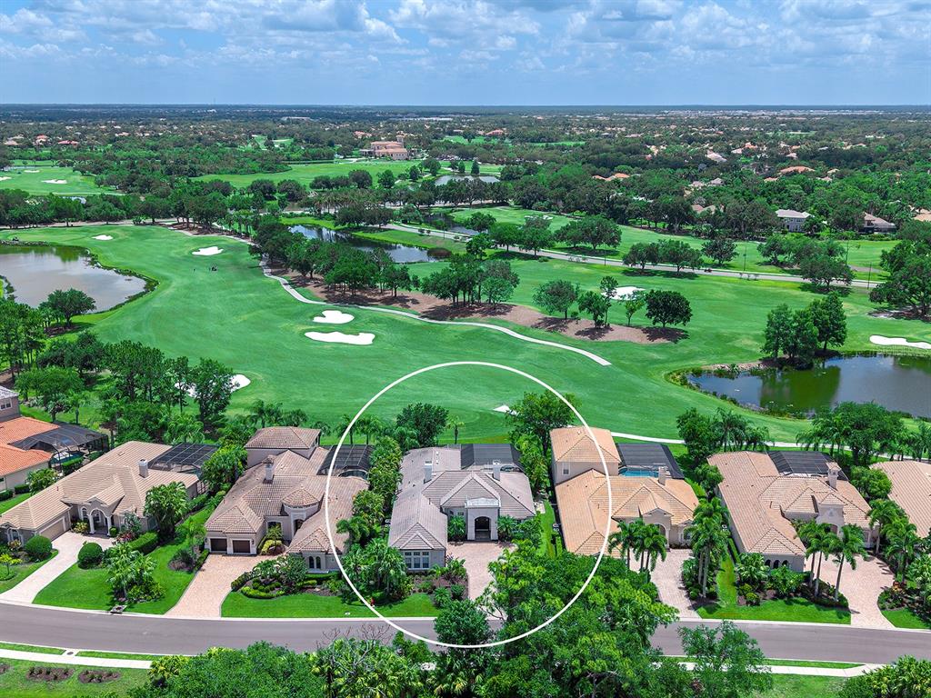 7431 Greystone Street Lakewood Ranch, FL 34202 - Photo 71 of 85 an aerial view of a house with outdoor space and street view