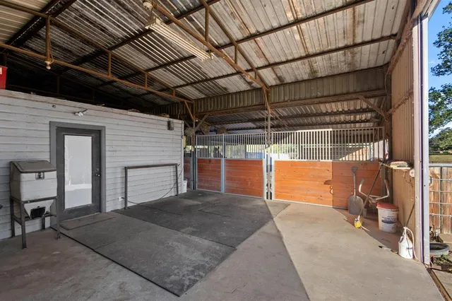 a bedroom with furniture and a area