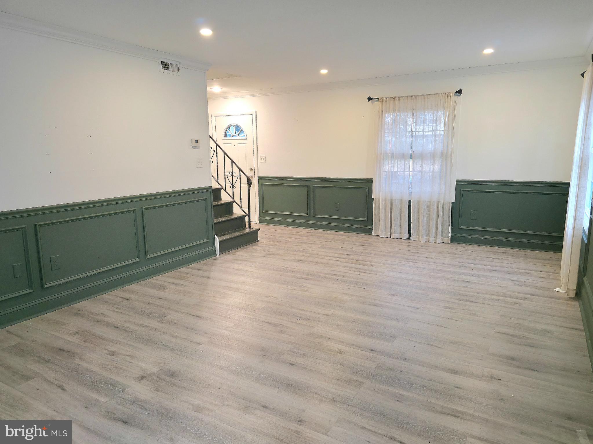 10 Melville Lane Willingboro, NJ 08046 - Photo 3 of 28 a view of a livingroom with wooden floor