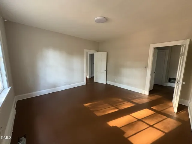 a view of an empty room and window