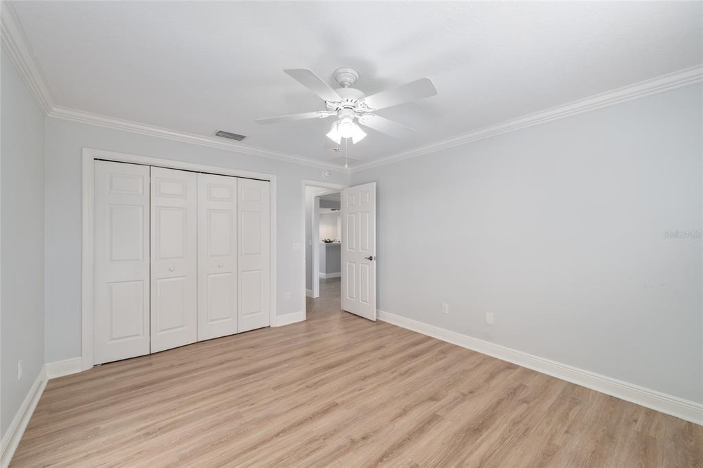 967 Livingston Loop The Villages, FL 32162 - Photo 28 of 62 a view of an empty room and wooden floor