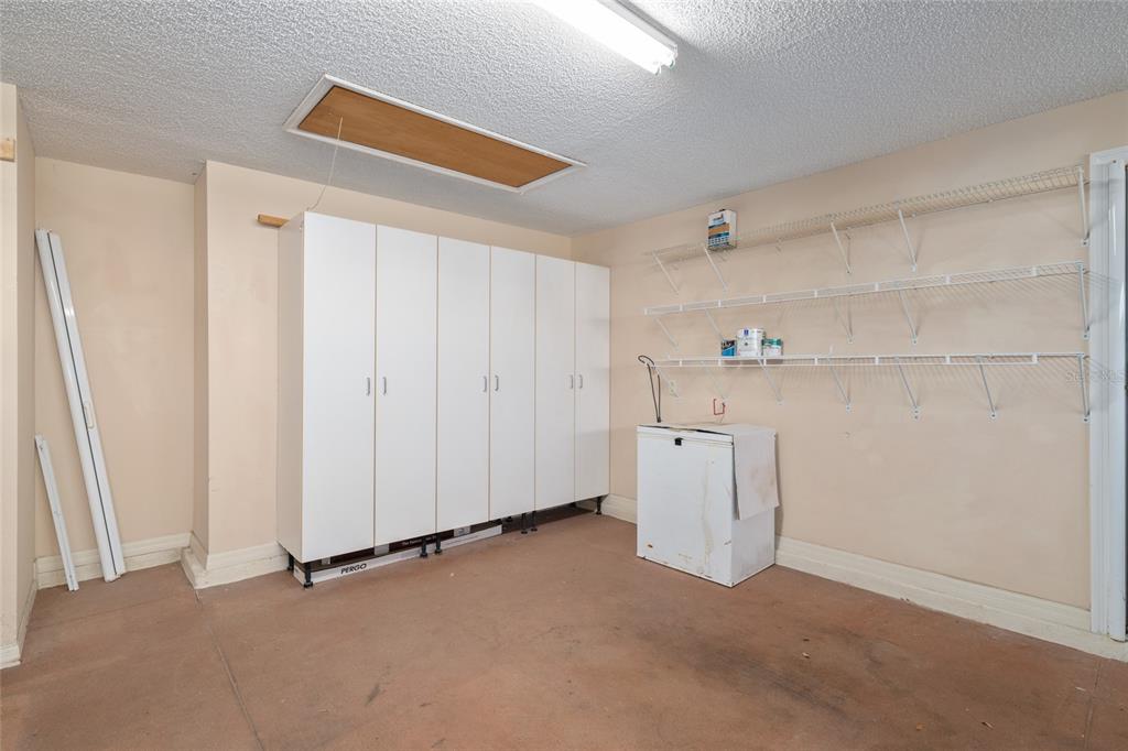 967 Livingston Loop The Villages, FL 32162 - Photo 40 of 62 a view of a storage & utility room with a sink