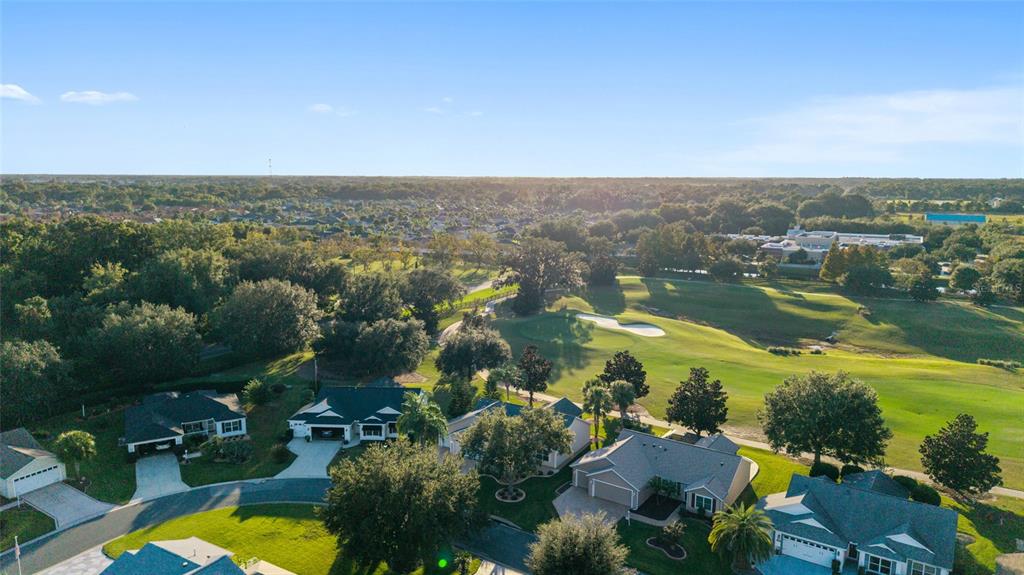 967 Livingston Loop The Villages, FL 32162 - Photo 48 of 62 an aerial view of residential houses with outdoor space and river