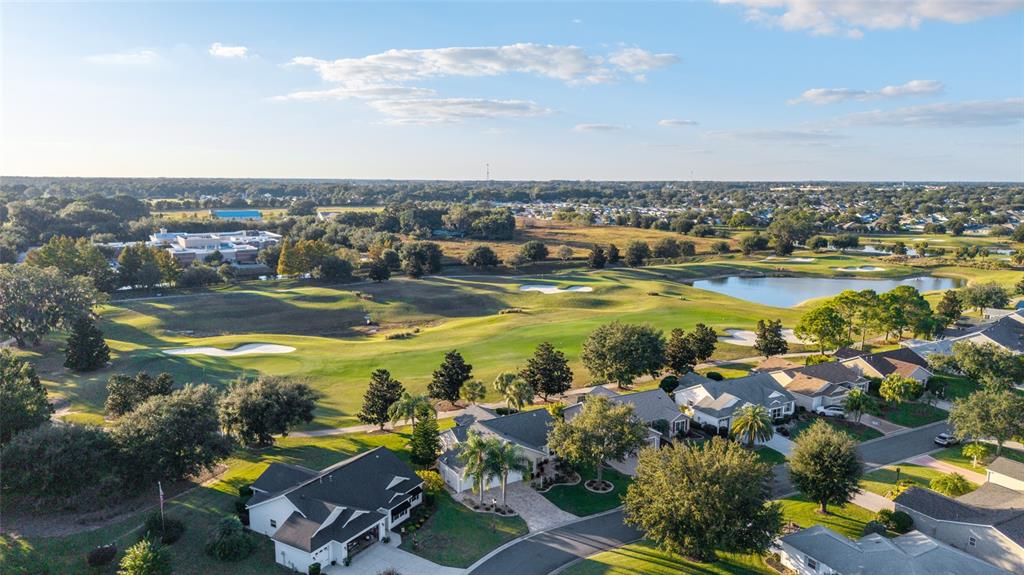 967 Livingston Loop The Villages, FL 32162 - Photo 50 of 62 an aerial view of residential houses with outdoor space