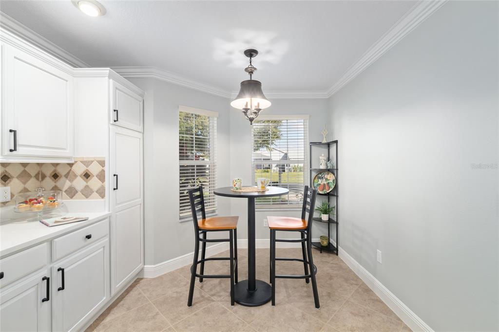 967 Livingston Loop The Villages, FL 32162 - Photo 10 of 62 a dining room with furniture and window