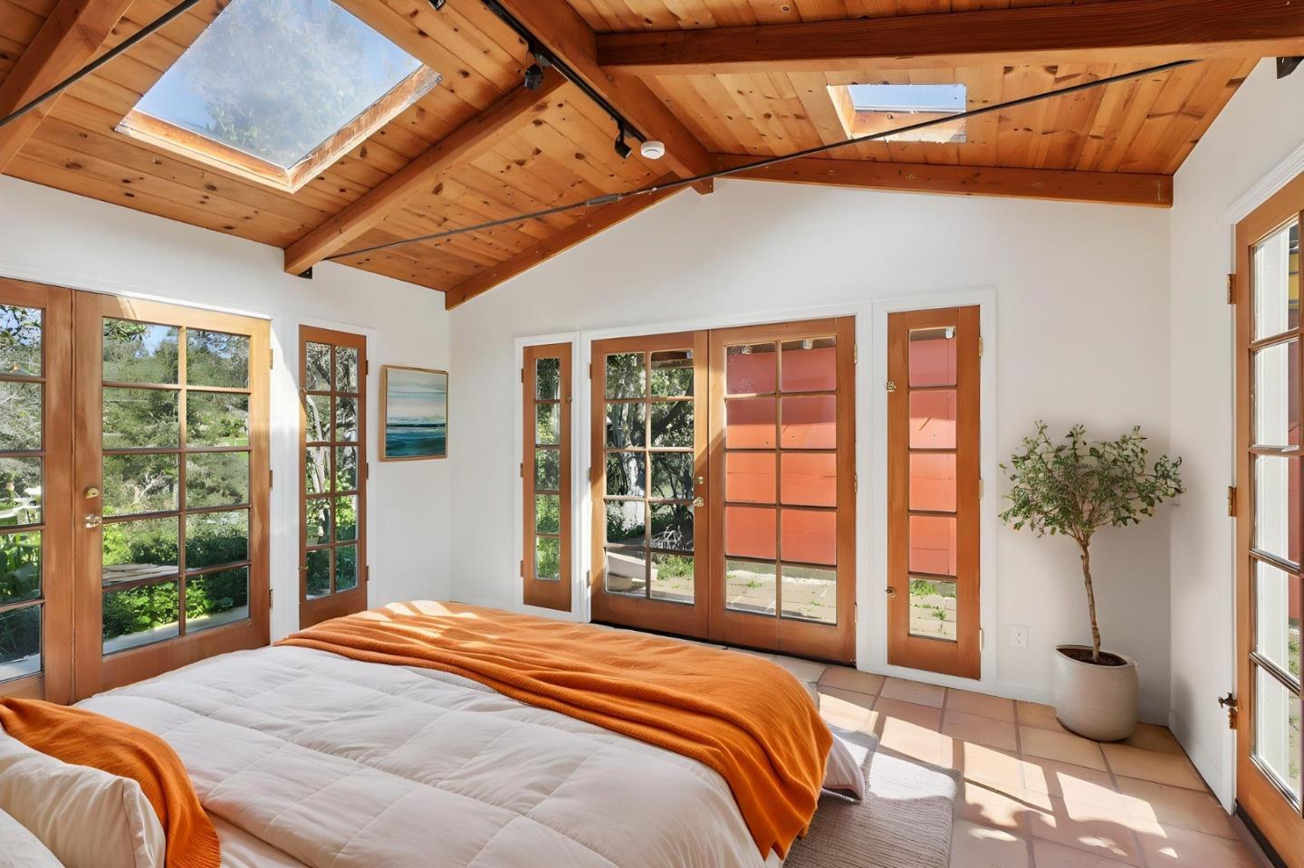 122 Strawberry Road Watsonville, CA 95076 - Photo 25 of 57 a bedroom with a large bed and a large window