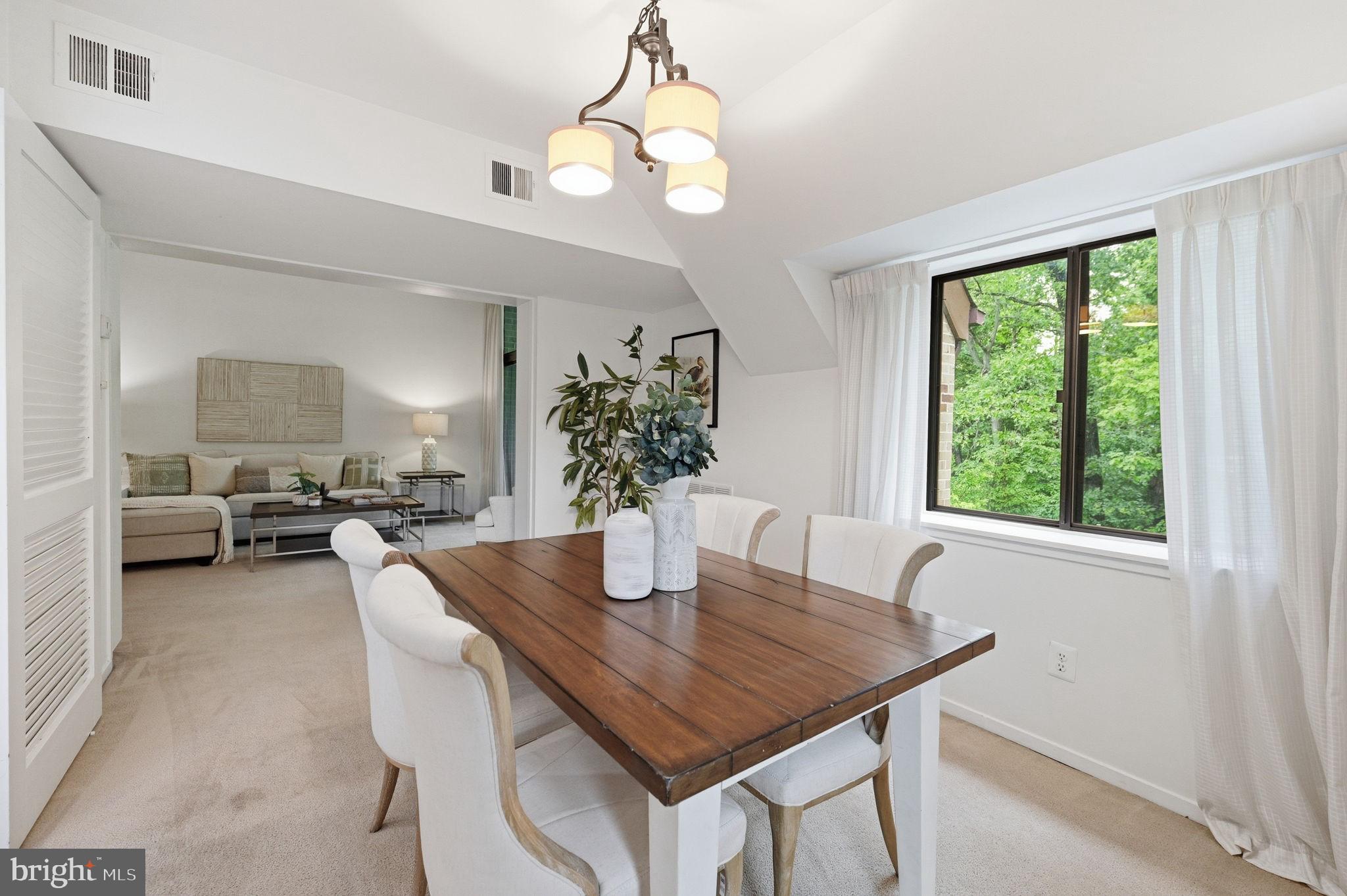 1659 Parkcrest Circle, Unit C Reston, VA 20190 - Photo 14 of 31 a view of a dining room with furniture window and wooden floor