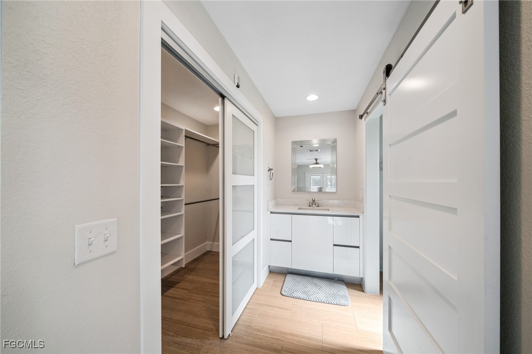 422 Coral Drive Cape Coral, FL 33904 - Photo 25 of 43 a bathroom with a shower and a sink