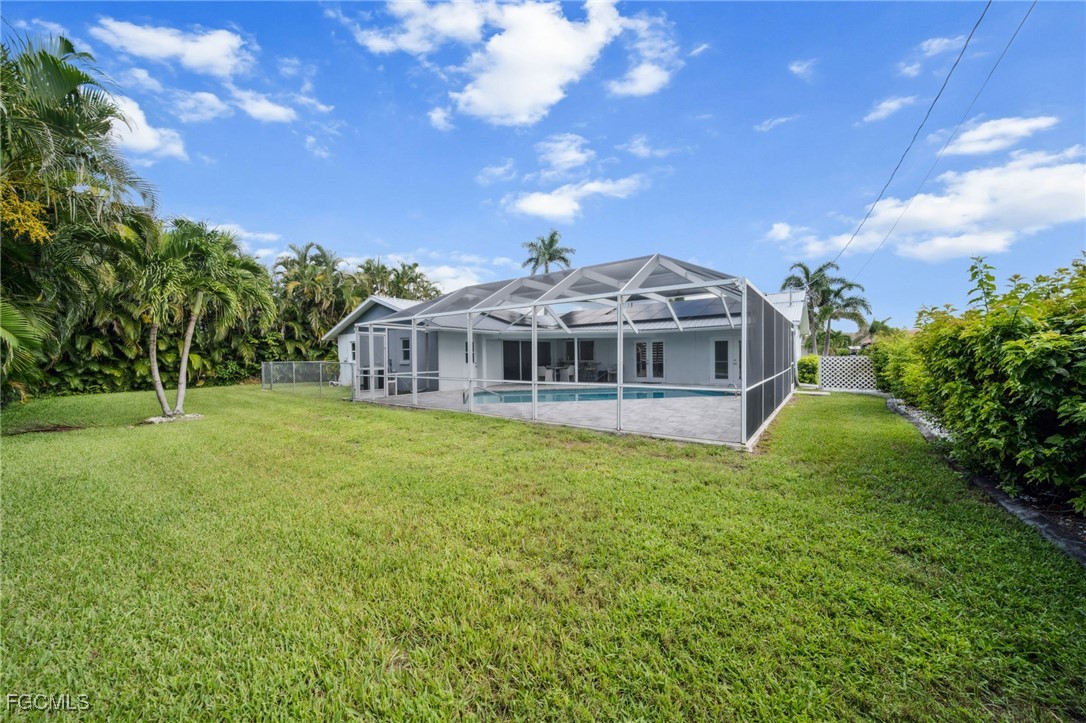422 Coral Drive Cape Coral, FL 33904 - Photo 33 of 43 a view of a house with a big yard