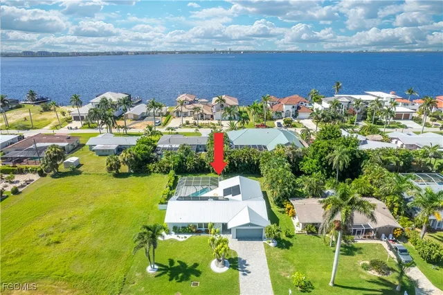 an aerial view of a house with a garden