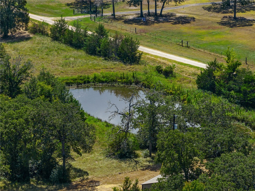 a view of a lake with a yard
