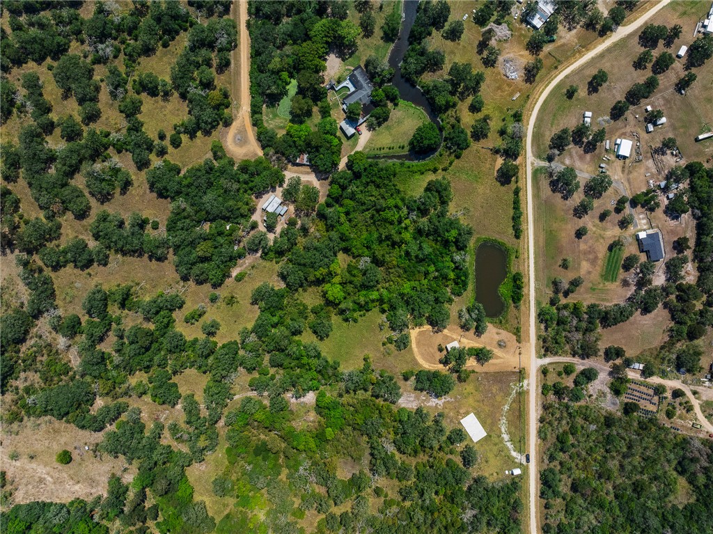 789 Quail Hollow Road Caldwell, TX 77836 - Photo 16 of 27 an aerial view of a residential houses with yard and outdoor space