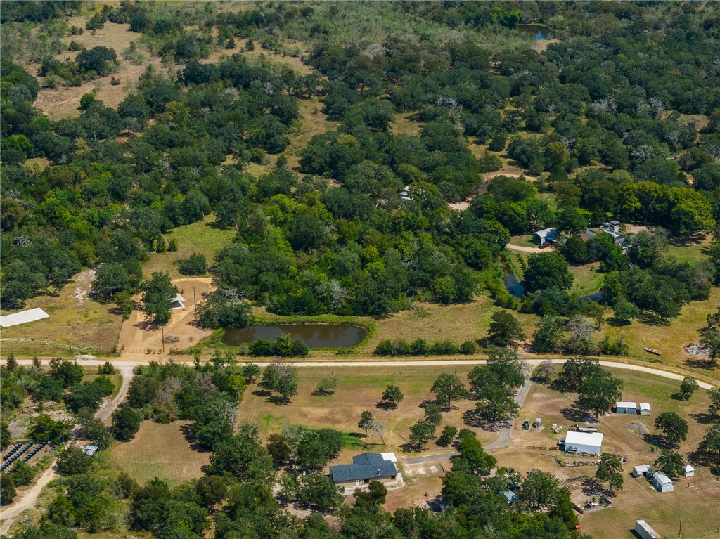 789 Quail Hollow Road Caldwell, TX 77836 - Photo 17 of 27 an aerial view of a houses with a yard