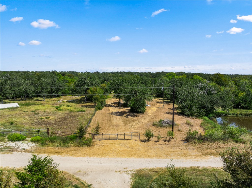 789 Quail Hollow Road Caldwell, TX 77836 - Photo 2 of 27 a view of a swimming pool with an ocean view