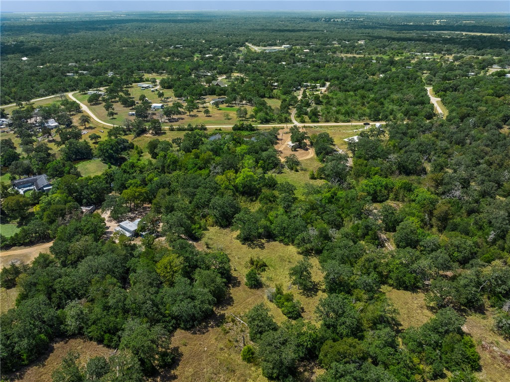 789 Quail Hollow Road Caldwell, TX 77836 - Photo 10 of 27 an aerial view of residential houses with outdoor space and trees