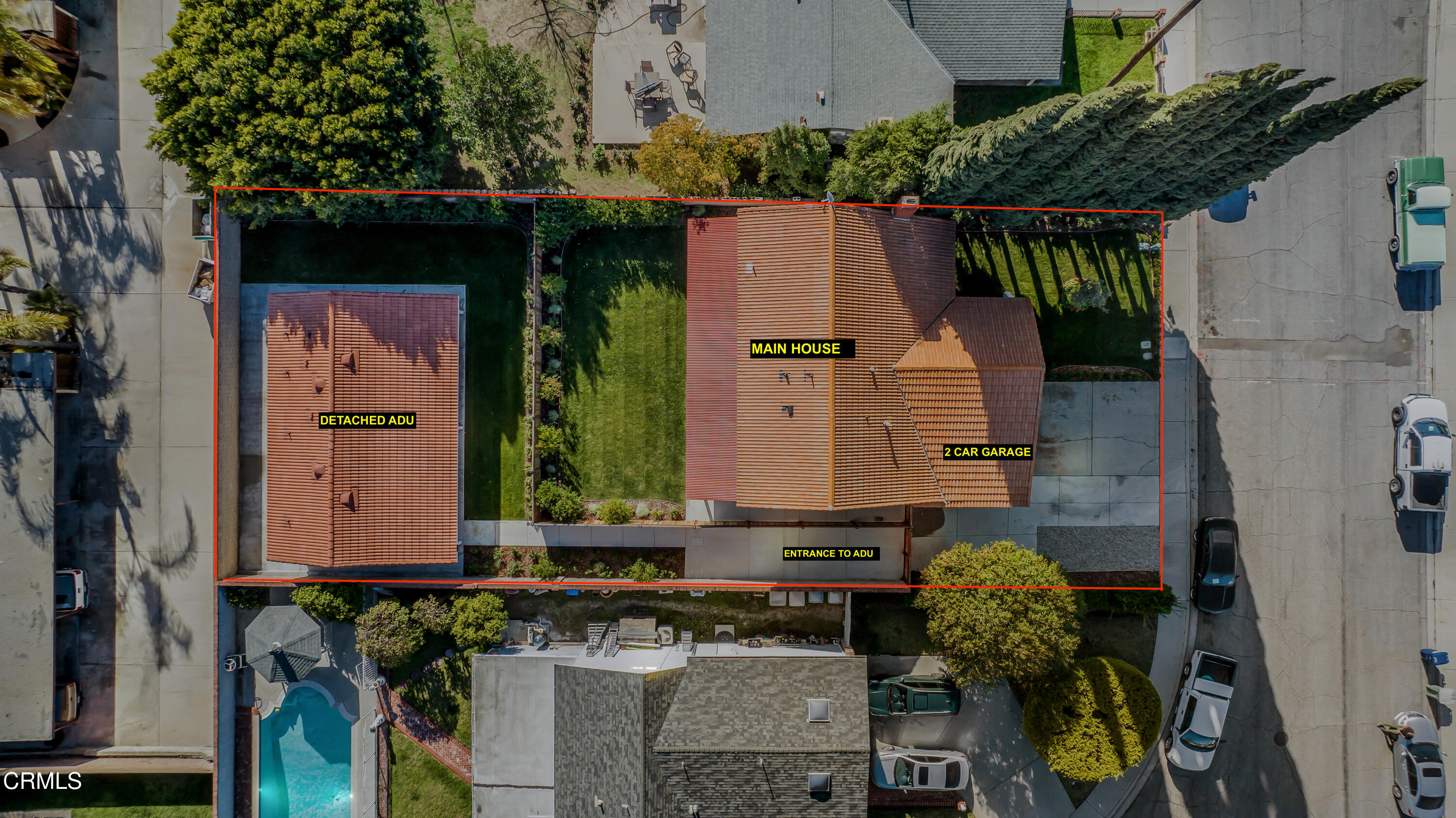 an aerial view of a house with swimming pool